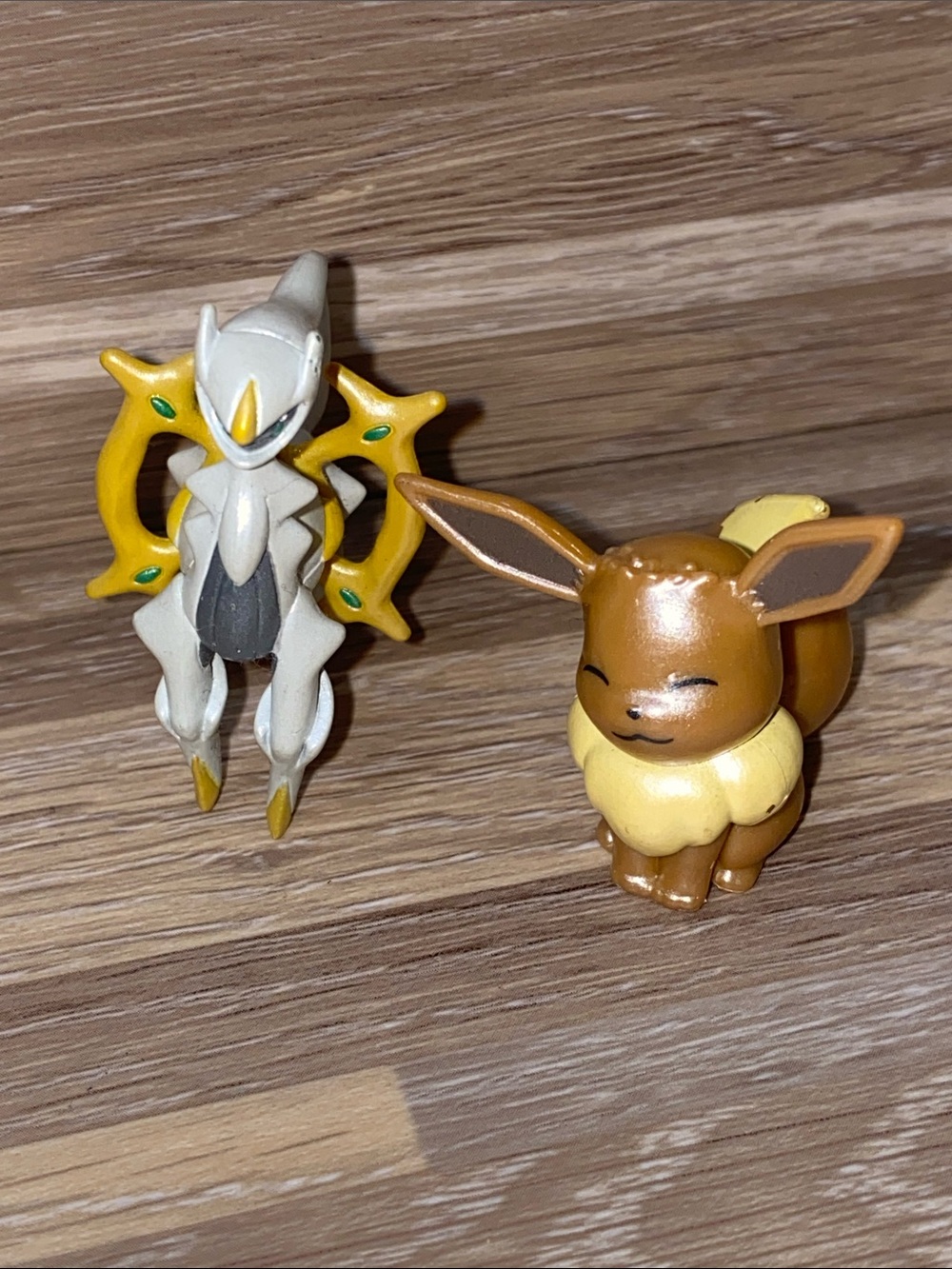 Eevee and Arceus Pokemon mini figurines